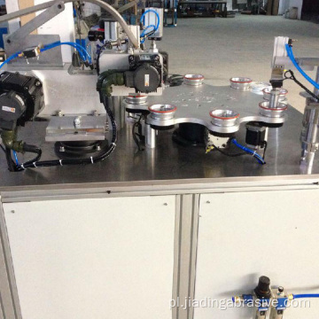Maszyna do produkcji tarcz ściernych o średnicy 180 mm produkuje bezpośrednio